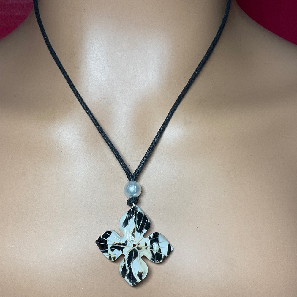 Vintage Spoted Shell Necklace. 29 inches long. Fully adjustable W/ Black Cord
